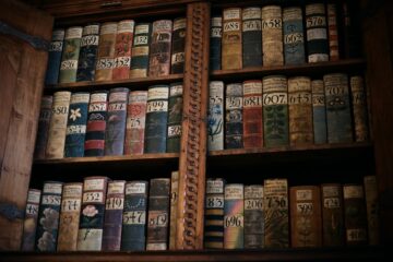 Destructive scanning machine cutting the spine of rare books for AI
