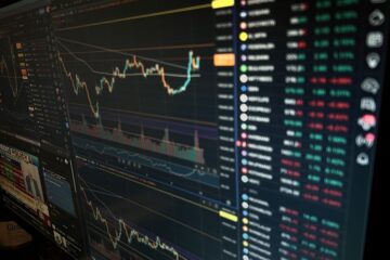Person reviewing AI financial advice on a laptop