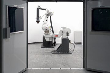 Ilustración conceptual de IA física: robots y sensores en un laboratorio científico
